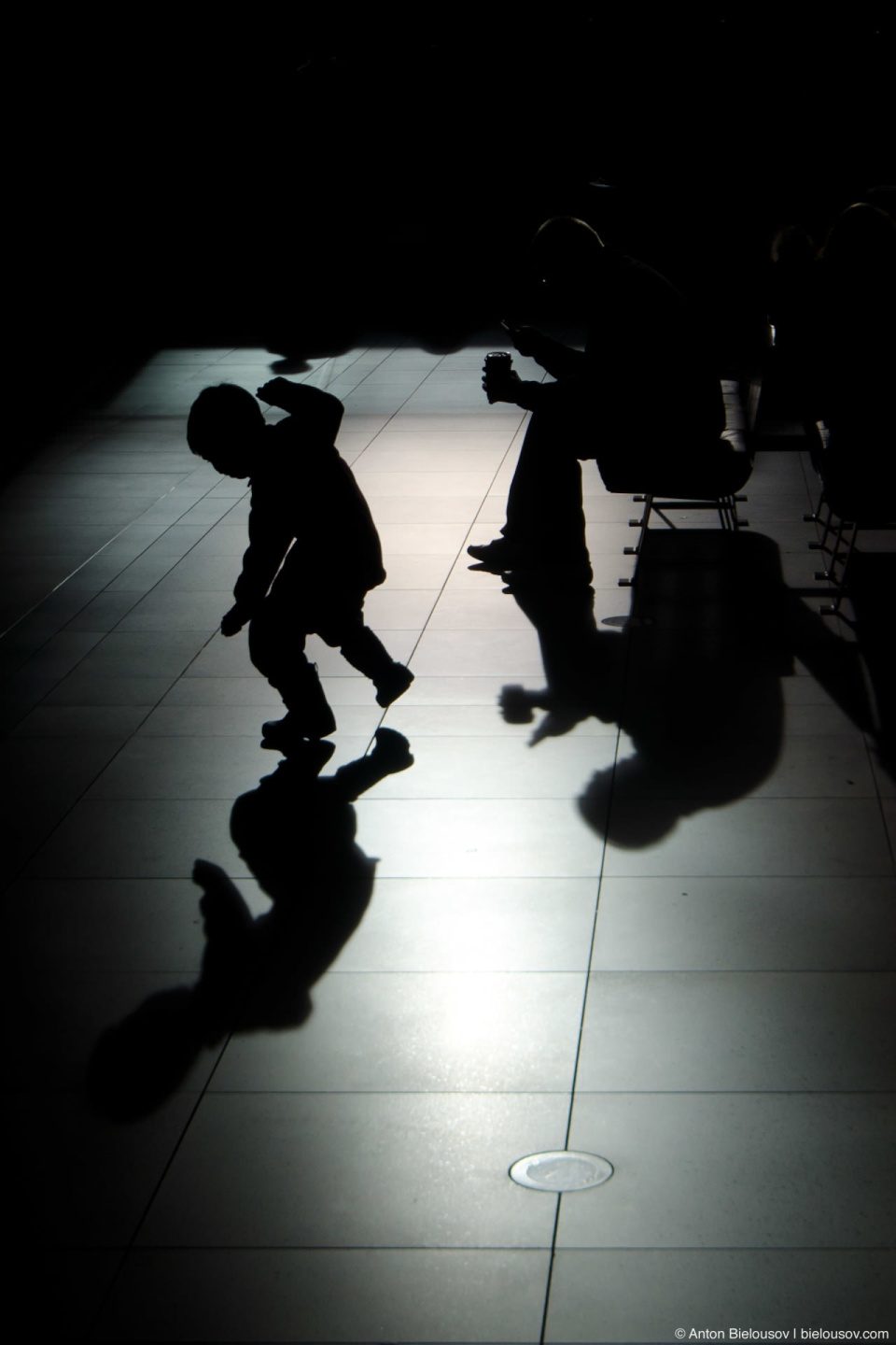 Dancing kid's shadow (Toronto Eaton's Centre)
