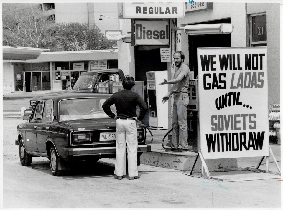 Courtesy of Toronto Public Library & the Toronto Star Archives. Photo credit Reg Innell -- Sign of the times: Star reporter Rick Brennan argues with gas station owner Neil Shepherd; who's refusing to gas Russian-made Lada cars -- 1980 Courtesy of Toronto Public Library & the Toronto Star Archives. Photo credit Reg Innell -- Sign of the times: Star reporter Rick Brennan argues with gas station owner Neil Shepherd; who's refusing to gas Russian-made Lada cars -- 1980